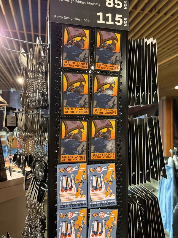 Fridge magnets depicting two Viking tourism poster designs (Oslo)