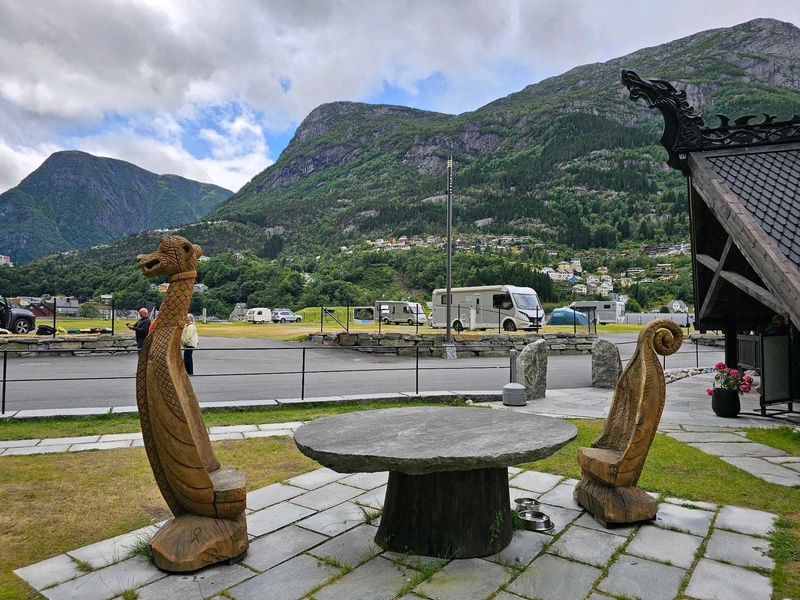 Langhuset restaurant- outdoor seating area with Viking inspired carvings