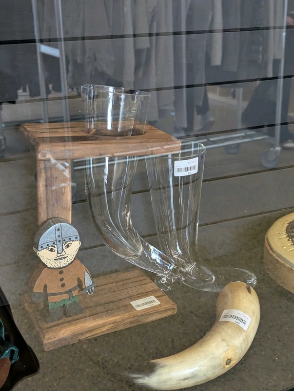 Replicated Viking-style drinking horns made of glass and of animal horn
