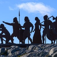 Photograph of Norse silhouette sculpture above L'Anse aux Meadows (K. Van Nieker)