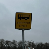 Runic bus-stop sign for the Viking Museum in Ladby