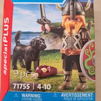 Playmobil viking figure with horned helmet and dog sidekick