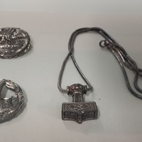 SS issued Thor's hammer and Viking ship badges (Nazi appropriation)