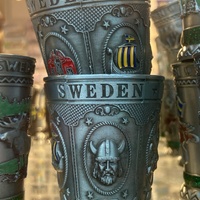 A pewter Viking branded shot glass