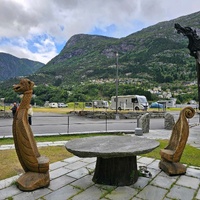 Langhuset restaurant- outdoor seating area with Viking inspired carvings