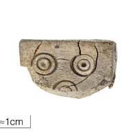 Bone dice with elder futhark runic inscription